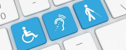 Computer keyboard with three buttons; one shows a figure in a wheelchair, one shows a figure using a cane, one shows an ear with a hearing aid.